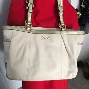 Cream and gold Coach bag. Gently used.